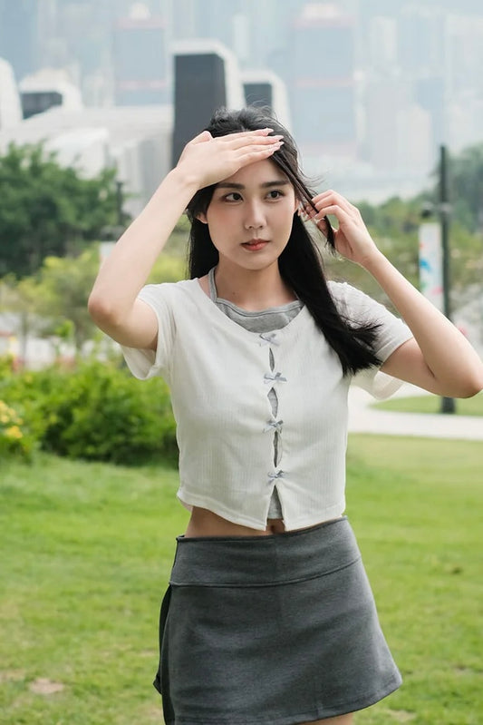 [現貨] \甜美假兩件/ 絲帶蝴蝶結掛頸Top